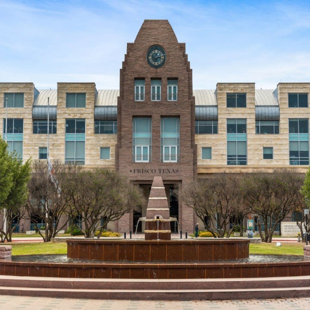 Frisco City Hall with its clock tower and fountain